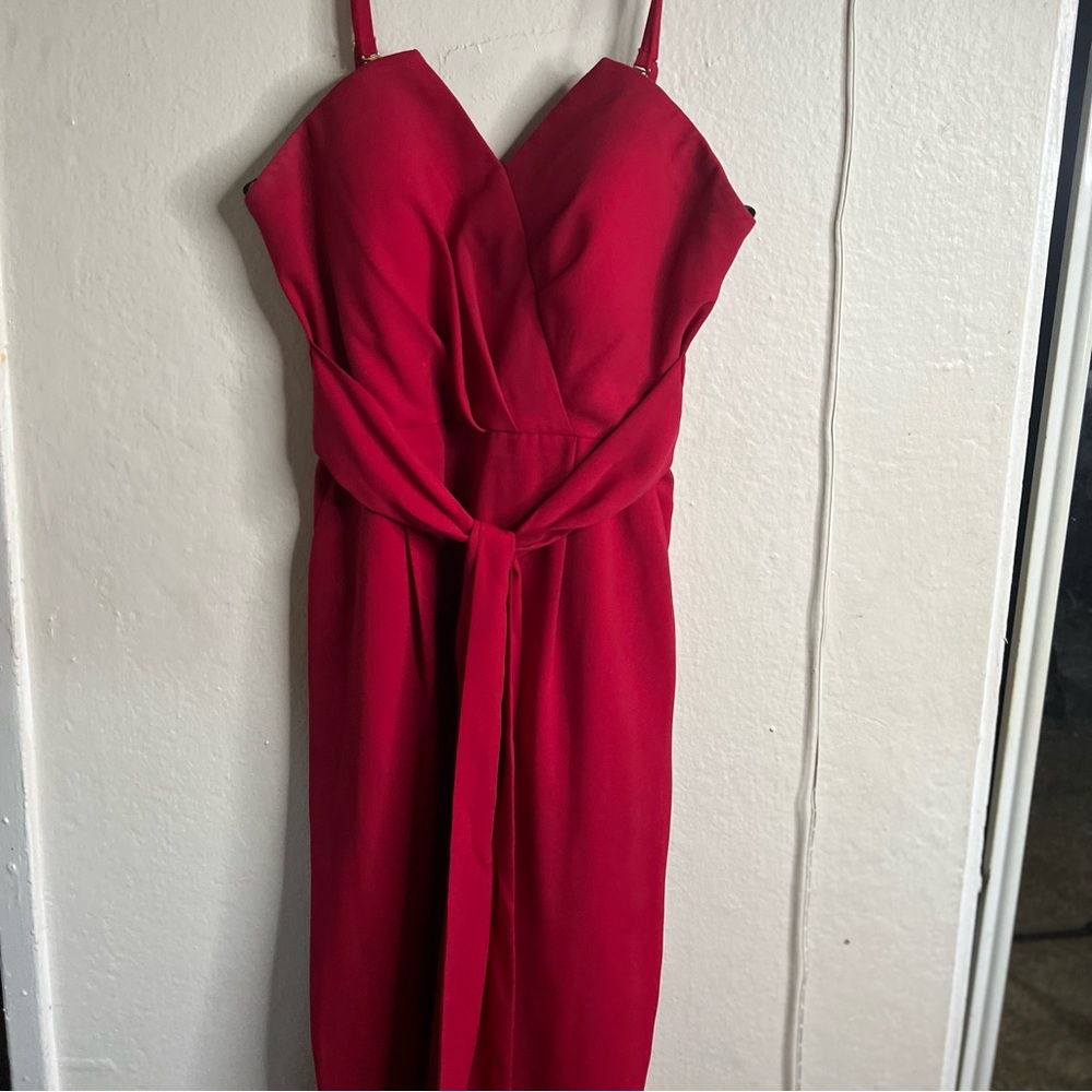 Bebe red jumpsuit with gold
